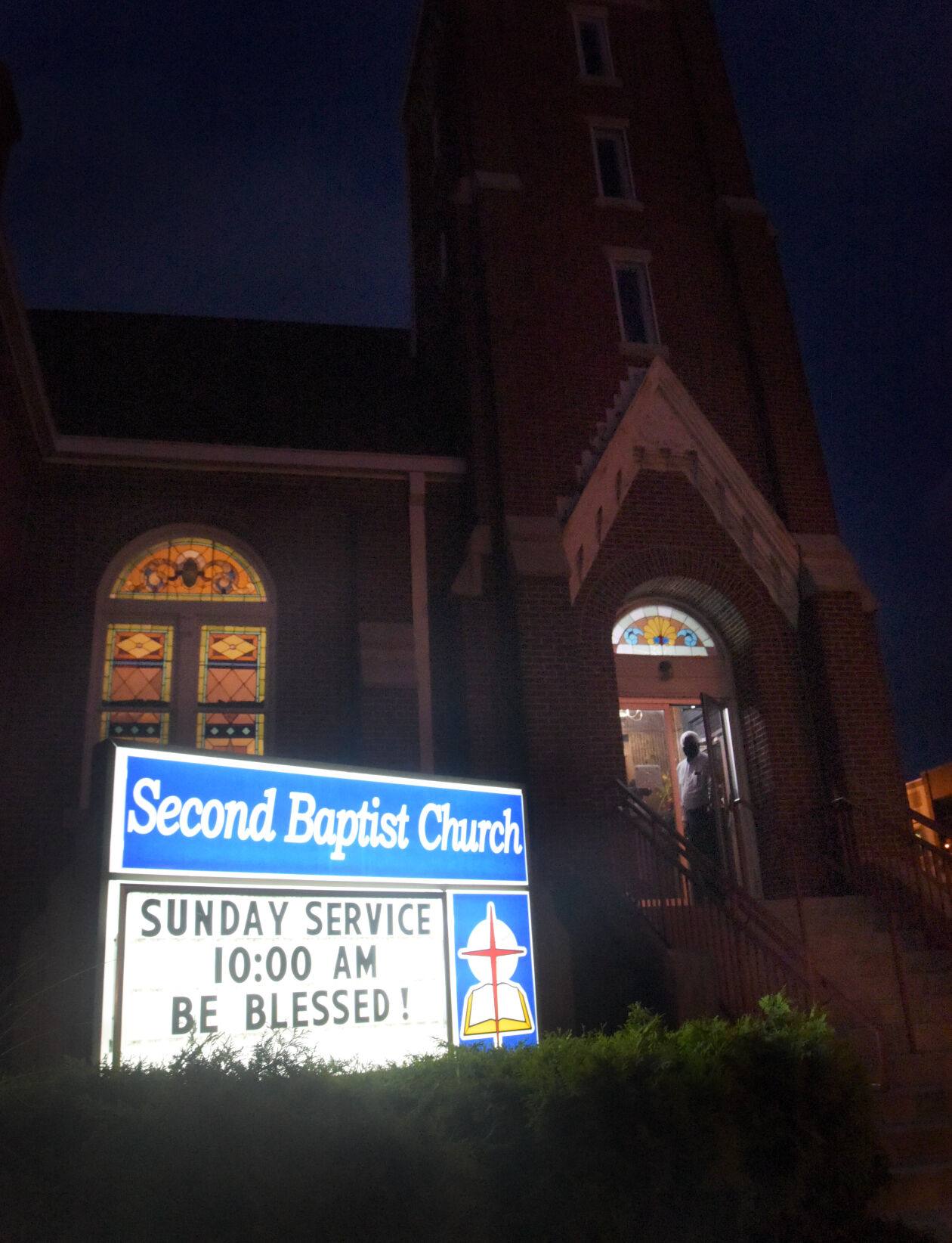 A concertgoer leaves the Second Baptist Church